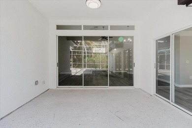 Short Sale. Step into this stunning split-floor plan residence on Tarpon Springs Golf Course in Florida - for sale on GolfHomes.com, golf home, golf lot