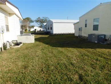 BIG PRICE DROP!!! Save money by making minor renovations on Largo Golf Course in Florida - for sale on GolfHomes.com, golf home, golf lot