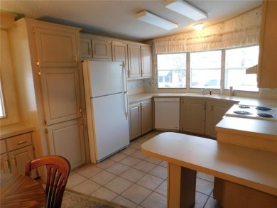 BIG PRICE DROP!!! Save money by making minor renovations on Largo Golf Course in Florida - for sale on GolfHomes.com, golf home, golf lot