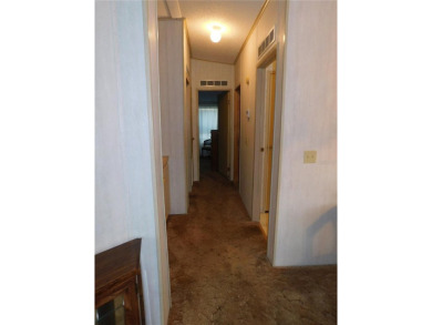 BIG PRICE DROP!!! Save money by making minor renovations on Largo Golf Course in Florida - for sale on GolfHomes.com, golf home, golf lot