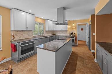 Located in the desirable Tellico Village community, this on Tanasi Golf Course in Tennessee - for sale on GolfHomes.com, golf home, golf lot