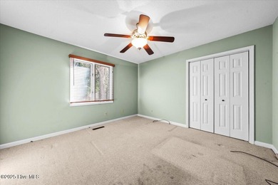 Easy one-story living in the heart of Pinehurst. This 3-bedroom on Pinehurst Resort and Country Club in North Carolina - for sale on GolfHomes.com, golf home, golf lot