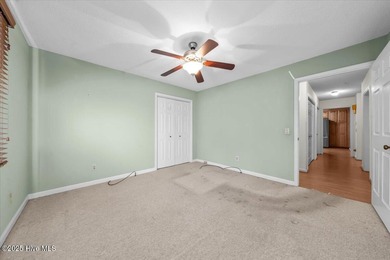 Easy one-story living in the heart of Pinehurst. This 3-bedroom on Pinehurst Resort and Country Club in North Carolina - for sale on GolfHomes.com, golf home, golf lot