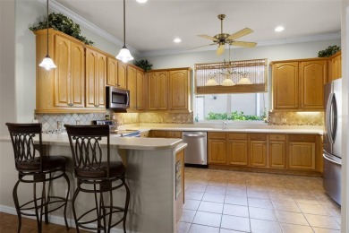 Step into the lifestyle you've been dreaming of in the vibrant on Plantation Golf Club in Florida - for sale on GolfHomes.com, golf home, golf lot