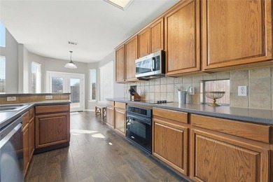 CHARMING 4-BEDROOM HOME with an AMAZING FLOOR PLAN! Step inside on The Golf Club At Champions Circle in Texas - for sale on GolfHomes.com, golf home, golf lot