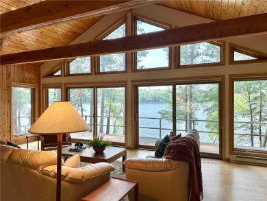 Less than a mile from downtown Walker, this beautifully crafted on Tianna Country Club in Minnesota - for sale on GolfHomes.com, golf home, golf lot