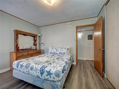 Welcome to Mustang Isle Condo #1. This fully furnished condo is on Palmilla Beach Golf Club in Texas - for sale on GolfHomes.com, golf home, golf lot