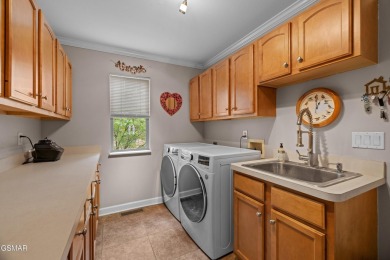 Located in the desirable Tellico Village community, this on Tanasi Golf Course in Tennessee - for sale on GolfHomes.com, golf home, golf lot