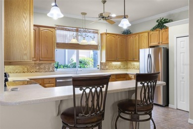 Step into the lifestyle you've been dreaming of in the vibrant on Plantation Golf Club in Florida - for sale on GolfHomes.com, golf home, golf lot