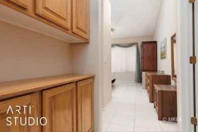 Located in a gated community on the highly sought-after Canyons on Wolf Creek At Paradise Canyon in Nevada - for sale on GolfHomes.com, golf home, golf lot