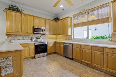 Step into the lifestyle you've been dreaming of in the vibrant on Plantation Golf Club in Florida - for sale on GolfHomes.com, golf home, golf lot