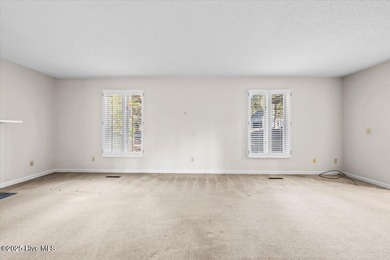 Easy one-story living in the heart of Pinehurst. This 3-bedroom on Pinehurst Resort and Country Club in North Carolina - for sale on GolfHomes.com, golf home, golf lot