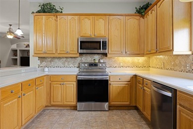 Step into the lifestyle you've been dreaming of in the vibrant on Plantation Golf Club in Florida - for sale on GolfHomes.com, golf home, golf lot