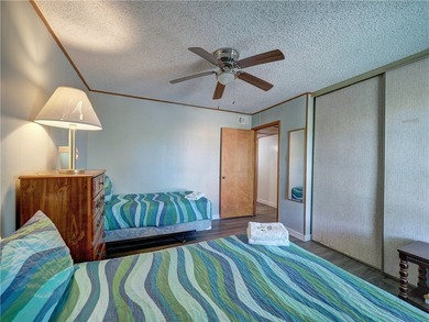 Welcome to Mustang Isle Condo #1. This fully furnished condo is on Palmilla Beach Golf Club in Texas - for sale on GolfHomes.com, golf home, golf lot