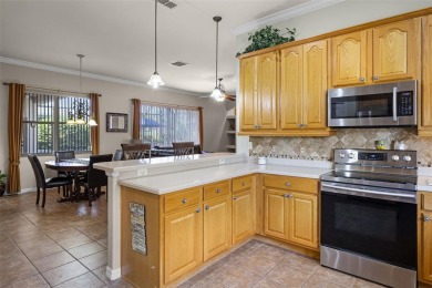 Step into the lifestyle you've been dreaming of in the vibrant on Plantation Golf Club in Florida - for sale on GolfHomes.com, golf home, golf lot