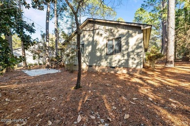 Easy one-story living in the heart of Pinehurst. This 3-bedroom on Pinehurst Resort and Country Club in North Carolina - for sale on GolfHomes.com, golf home, golf lot