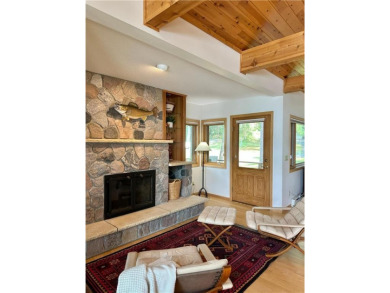 Less than a mile from downtown Walker, this beautifully crafted on Tianna Country Club in Minnesota - for sale on GolfHomes.com, golf home, golf lot