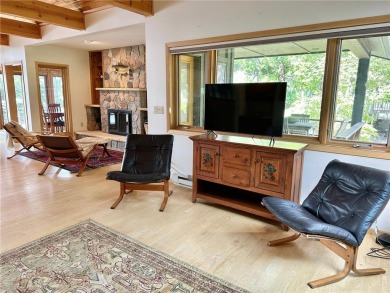 Less than a mile from downtown Walker, this beautifully crafted on Tianna Country Club in Minnesota - for sale on GolfHomes.com, golf home, golf lot