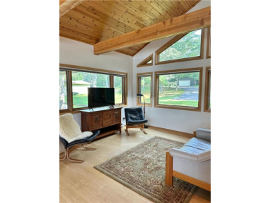 Less than a mile from downtown Walker, this beautifully crafted on Tianna Country Club in Minnesota - for sale on GolfHomes.com, golf home, golf lot