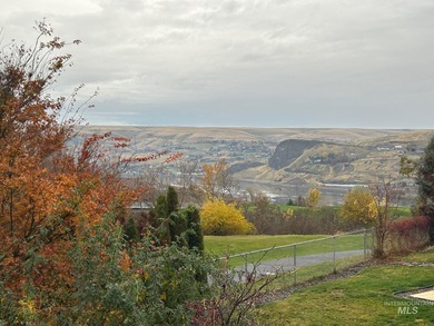 Gorgeous 4-bedroom, 3-bath home perfectly positioned on Lewiston on Lewiston Golf and Country Club in Idaho - for sale on GolfHomes.com, golf home, golf lot
