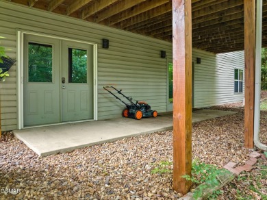 Located in the desirable Tellico Village community, this on Tanasi Golf Course in Tennessee - for sale on GolfHomes.com, golf home, golf lot