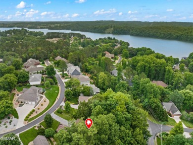 Located in the desirable Tellico Village community, this on Tanasi Golf Course in Tennessee - for sale on GolfHomes.com, golf home, golf lot