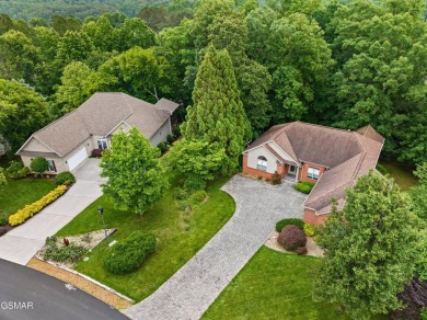 Located in the desirable Tellico Village community, this on Tanasi Golf Course in Tennessee - for sale on GolfHomes.com, golf home, golf lot