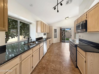 Nestled in the desirable guard-gated Sun Village 55+ community on Sun Village Golf Course in Arizona - for sale on GolfHomes.com, golf home, golf lot