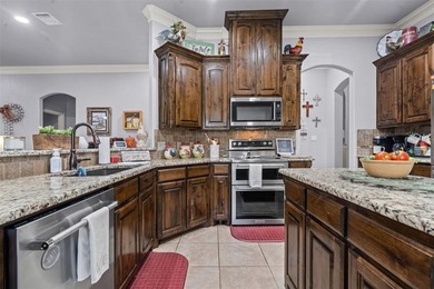 Welcome to this meticulously maintained, single-story on Pecan Plantation Country Club in Texas - for sale on GolfHomes.com, golf home, golf lot