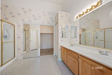 This home offers two primary suites, each with its own private on CasaBlanca Resort and Casino in Nevada - for sale on GolfHomes.com, golf home, golf lot