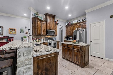 Welcome to this meticulously maintained, single-story on Pecan Plantation Country Club in Texas - for sale on GolfHomes.com, golf home, golf lot