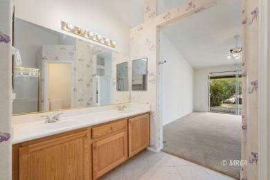 This home offers two primary suites, each with its own private on CasaBlanca Resort and Casino in Nevada - for sale on GolfHomes.com, golf home, golf lot
