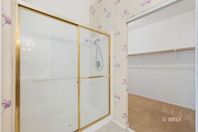 This home offers two primary suites, each with its own private on CasaBlanca Resort and Casino in Nevada - for sale on GolfHomes.com, golf home, golf lot