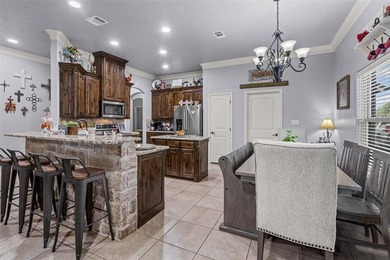 Welcome to this meticulously maintained, single-story on Pecan Plantation Country Club in Texas - for sale on GolfHomes.com, golf home, golf lot