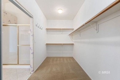 This home offers two primary suites, each with its own private on CasaBlanca Resort and Casino in Nevada - for sale on GolfHomes.com, golf home, golf lot