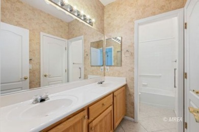 This home offers two primary suites, each with its own private on CasaBlanca Resort and Casino in Nevada - for sale on GolfHomes.com, golf home, golf lot