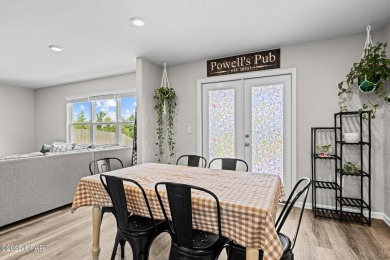 This exquisite 5-bedroom, 4-bathroom home boasts 4,128 sq/ft of on Bay Dunes in Florida - for sale on GolfHomes.com, golf home, golf lot