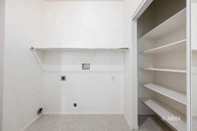 This home offers two primary suites, each with its own private on CasaBlanca Resort and Casino in Nevada - for sale on GolfHomes.com, golf home, golf lot