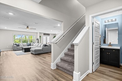 This exquisite 5-bedroom, 4-bathroom home boasts 4,128 sq/ft of on Bay Dunes in Florida - for sale on GolfHomes.com, golf home, golf lot