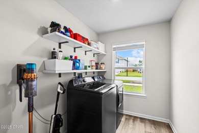 This exquisite 5-bedroom, 4-bathroom home boasts 4,128 sq/ft of on Bay Dunes in Florida - for sale on GolfHomes.com, golf home, golf lot