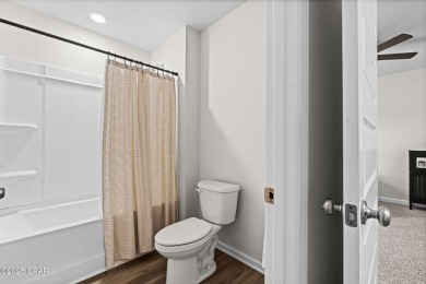 This exquisite 5-bedroom, 4-bathroom home boasts 4,128 sq/ft of on Bay Dunes in Florida - for sale on GolfHomes.com, golf home, golf lot