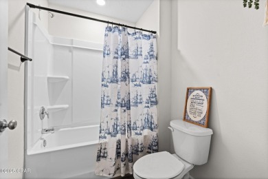 This exquisite 5-bedroom, 4-bathroom home boasts 4,128 sq/ft of on Bay Dunes in Florida - for sale on GolfHomes.com, golf home, golf lot