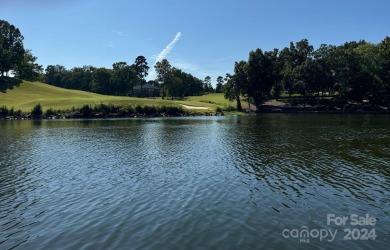 This well-maintained lakefront home has it all! Impressive stone on Old North State Club in North Carolina - for sale on GolfHomes.com, golf home, golf lot