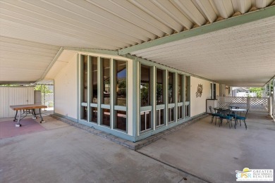 Dramatic mountain views enhance this open and light home behind on Date Palm Country Club in California - for sale on GolfHomes.com, golf home, golf lot