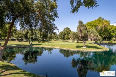 Dramatic mountain views enhance this open and light home behind on Date Palm Country Club in California - for sale on GolfHomes.com, golf home, golf lot