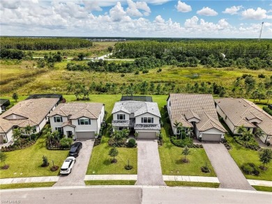 Welcome to your dream home in one of Estero's most coveted gated on Old Corkscrew Golf Club in Florida - for sale on GolfHomes.com, golf home, golf lot
