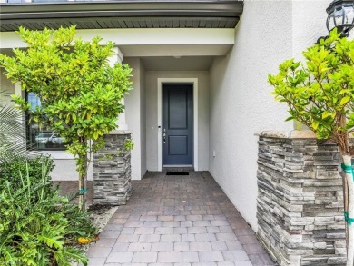 Welcome to your dream home in one of Estero's most coveted gated on Old Corkscrew Golf Club in Florida - for sale on GolfHomes.com, golf home, golf lot