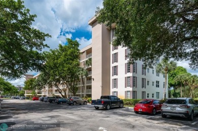 Ground floor unit walk out to the pool! 1100+ square foot 2bd on Palm-Aire Country Club and Resort - Palms in Florida - for sale on GolfHomes.com, golf home, golf lot