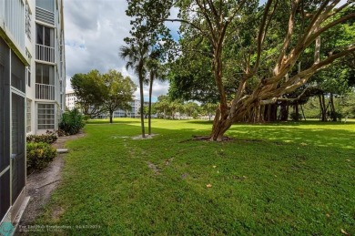 Ground floor unit walk out to the pool! 1100+ square foot 2bd on Palm-Aire Country Club and Resort - Palms in Florida - for sale on GolfHomes.com, golf home, golf lot