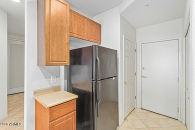 Enter into comfortable living with this delightful townhome in on Superstition Springs Golf Club in Arizona - for sale on GolfHomes.com, golf home, golf lot